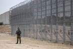 以色列沿加沙地带“智能”隔离墙修建完成