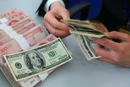 中国外交部：人民币汇率法案“损人不利己”