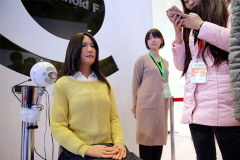 A robot created at Osaka University is displayed at conference in Beijing on November 23