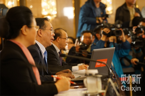Spokesman Wang Guoqing speaks at a press conference on March 2 before the opening of the Chinese People's Political Consultative Conference