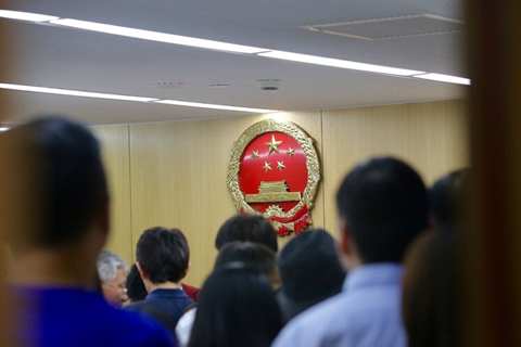 A marriage registration office in Shanghai packed with couples filing for a divorce amid rumors of a new housing market curb
