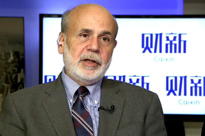 American economist Ben Bernanke, the chairman of the Federal Reserve from 2006 to 2014, gives a speech via a video connection at the seventh Caixin Summit on Friday. Photo: Caixin