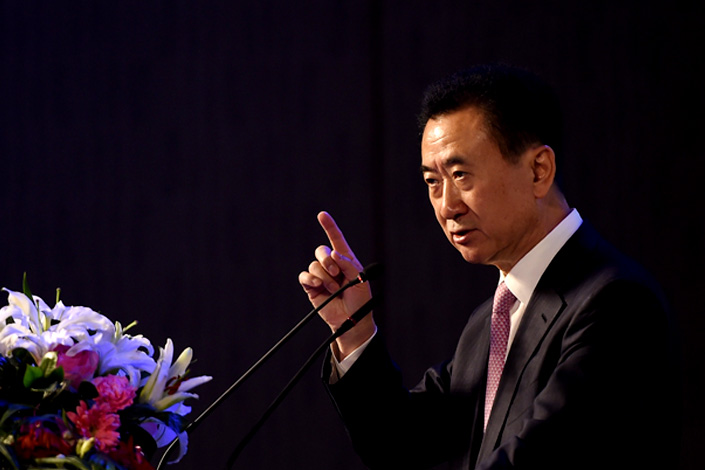 Wang Jianlin, chairman and president of Dalian Wanda Group Co., speaks during a news conference Wednesday in Beijing. Photo: Visual China