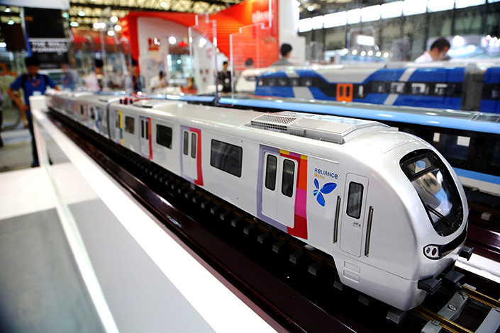 A model of a Mumbai Metro No.1 train is displayed at the China International Rail and Metro Exhibition on June 12, 2015, in Shanghai. CRRC Corp Ltd. has reached an agreement to sell 120 subway cars to the Massachusetts Bay Transportation Authority. Photo: IC