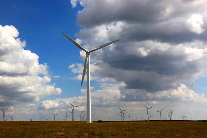 Windmills for generating electricity are seen in the Inner Mongolia autonomous region in August 2015. China's National Energy Administration has suspended any new wind-power projects in six provincial-level governments, saying they had too many wind farms unconnected to the national grid. Photo: Visual China