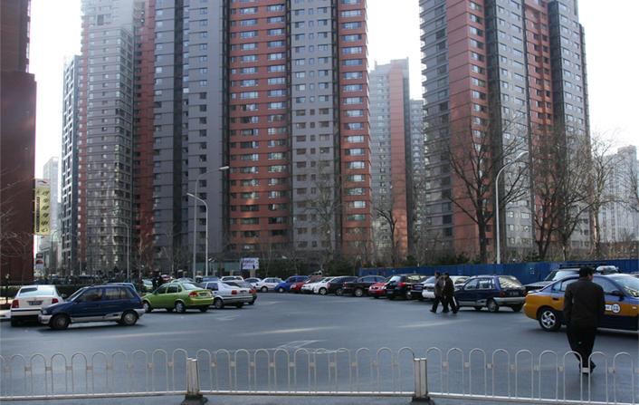Chengdu is following the steps of Beijing and others closing in a real estate loophole for housing speculators. An office complex such as the one above in Beijing is often converted into private apartments. Photo: IC