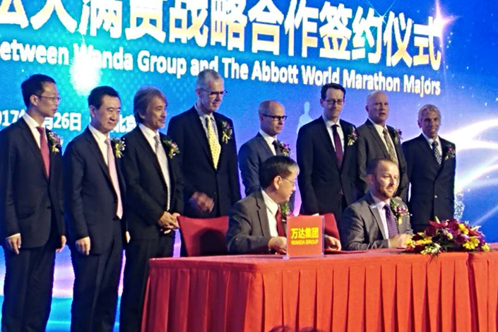 Representatives from six of the world’s top marathons attend a signing ceremony in Beijing to develop three world class marathons in Asia with China’s Wanda Group on April 26. Wanda plans to inaugurate the World Marathon Major China race by 2020. Photo: Yang Ge