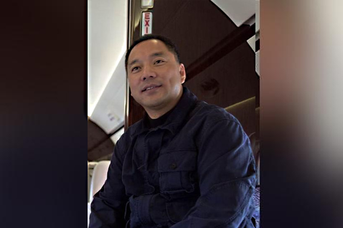 Three former employees of Chinese fugitive tycoon Guo Wengui, above, were sentenced to prison on Friday for obtaining loans and foreign currency with fraudulent documents under Guo’s instruction.