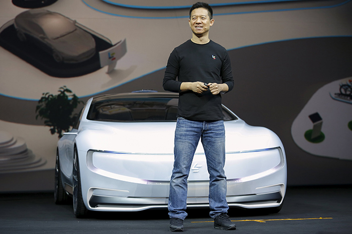 LeEco’s listed unit is set for over 600 million yuan ($89 million) in losses for the first six months of this year, LeEco forecast Friday evening. Above, company founder Jia Yueting unveils the LeSEE, LeEco’s fully electric car, in Beijing in April 2016. Photo: Visual China