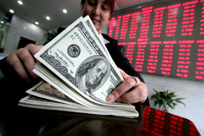 The People’s Bank of China sold 34.3 billion yuan ($5.1 billion) worth of foreign currency to banks in June, the first time the figure has increased in seven months. Photo: IC
