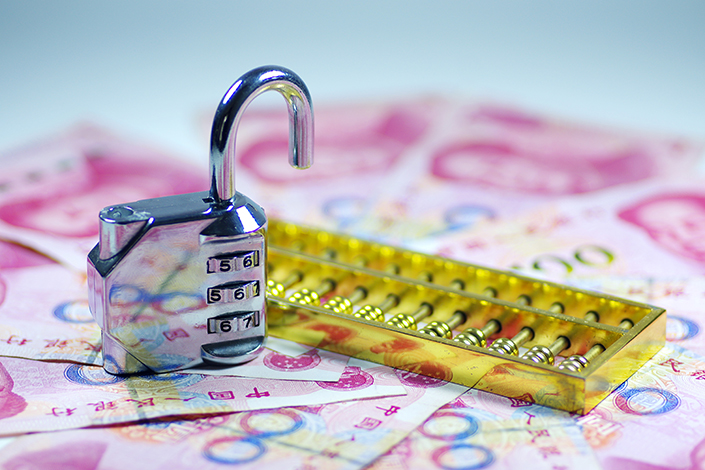 The China Insurance Regulatory Commission is considering imposing longer lockup periods for shareholders, including a five-year moratorium on selling for those who own 30% or more of a company's stock. Photo: IC