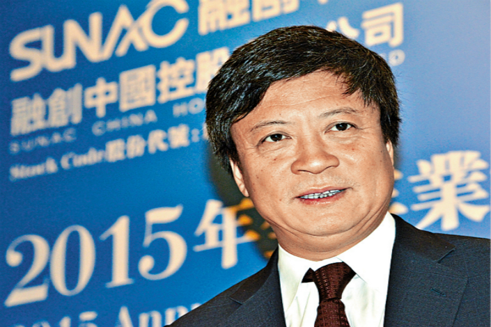 Sunac China Holdings Ltd. has unveiled a plan to raise HK$4.03 billion ($516 million) through a sale of 220 million new shares at HK$18.33 each. Above, Sun Hongbin, Sunac founder and chairman, attends a news conference in Hong Kong on March 29, 2016. Photo: IC