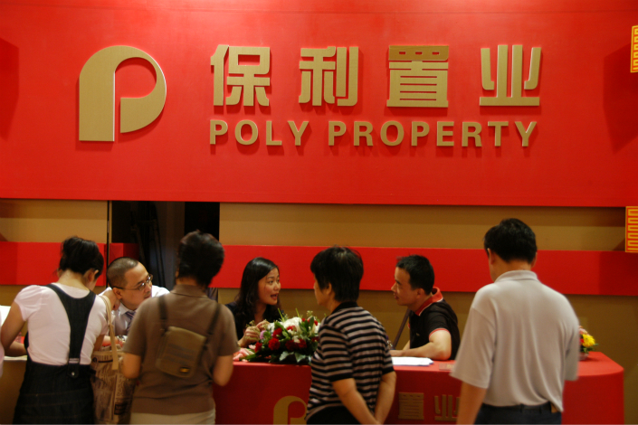 Military giant Poly Group Corp., whose businesses also include real estate, has taken over two other centrally administrated State-owned enterprises — Sinolight Corp. and China National Arts & Crafts (Group) Corp. in the government’s push to improve their efficiency. Photo: Visual China