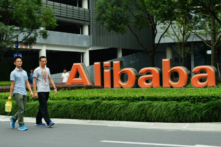 Alibaba Group Holdings Ltd. is strengthening its offline operations, with one goal to rebrand 10,000 mom-and-pop stores under the name of its online marketplace, Tmall. Above, Alibaba's Hangzhou headquarters are seen on Aug. 11. Photo: Visual China