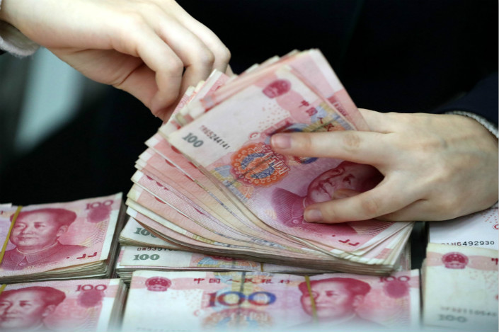 The People’s Bank of China on Wednesday set the yuan’s central parity rate at 6.6102 against the dollar, its strongest level since Aug. 17, 2016. Photo: Visual China