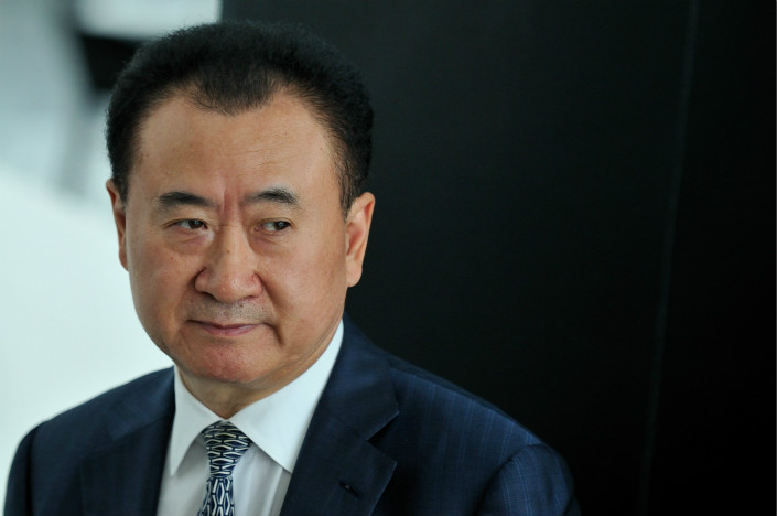 Wanda Group has filed suit against several media outlets for reporting that founder Wang Jianlin was prevented from leaving China, reports the company denies. Wang is seen here in a file photo. Photo: Visual China