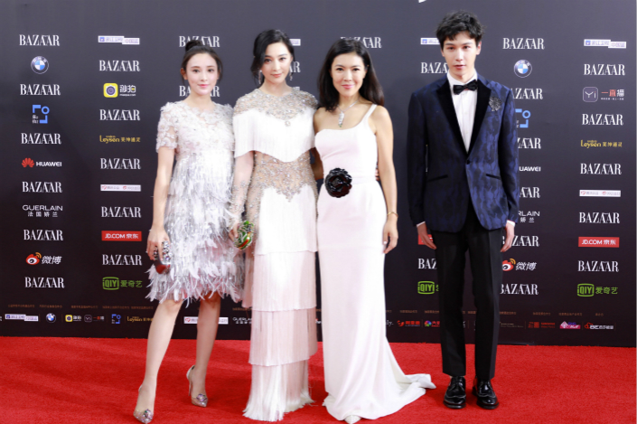 New guidelines on actors' salaries come as Beijing tries to slow a recent spending wave on areas that it considers extravagant, mostly from the sports and entertainment sectors. Above, entertainment stars, including actress Fan Bingbing (second from left), appear at a charity event on Sept. 9 in Beijing. Photo: Visual China