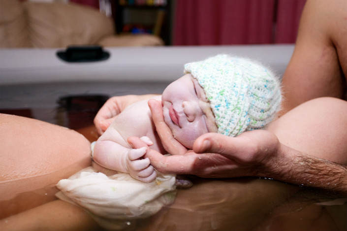 A baby is born via water birth. Many experts have called for more water births to ease the mother's childbirth pains, but fewer than a third of hospitals in China have the necessary facilities. Photo: Visual China