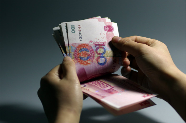 Limiting commercial banks’ investment in “nonstandard credit assets” is a goal of the Chinese government, but one type of nonstandard credit asset — credit beneficiary rights — has somehow managed to escape regulatory oversight. Photo: Visual China