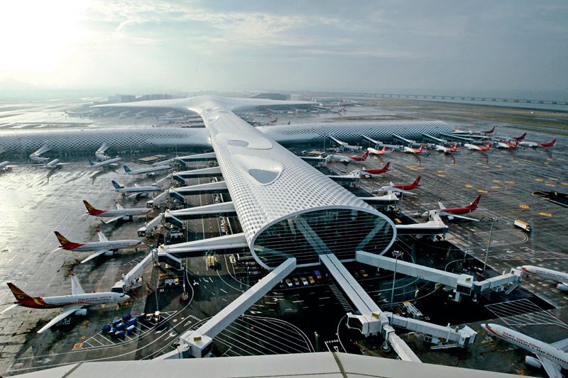 The Guangdong provincial government is studying the feasibility of merging the airports of the three largest cities under its jurisdiction — Guangzhou, Shenzhen and Zhuhai — to boost regional integration, but Shenzhen city officials are resisting the plan. Above, the new terminal of Shenzhen Baoan International Airport officially opened on Nov. 28, 2013. Photo: CNS