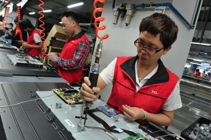 As a large manufacturer with 36 years of history, TCL has suffered from increasingly powerful inertia, with the company becoming slow-moving and long-serving employees not being punished for poor performance. Above, workers make TVs at a TCL factory in its hometown of Huizhou, Guangdong province. Photo: Visual China