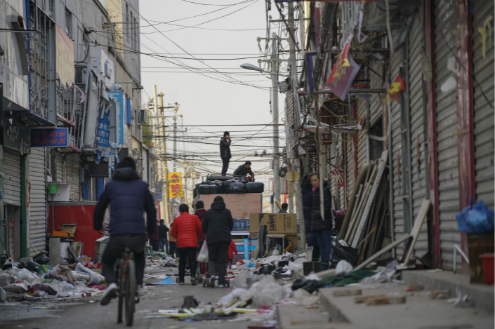Pictures and videos of migrant families traveling around the city, desperately trying to find a place to stay in the middle of winter, have sparked an outpouring of support online, with individuals and NGOs offering temporary shelter and information on rental homes. Photo: Caixin