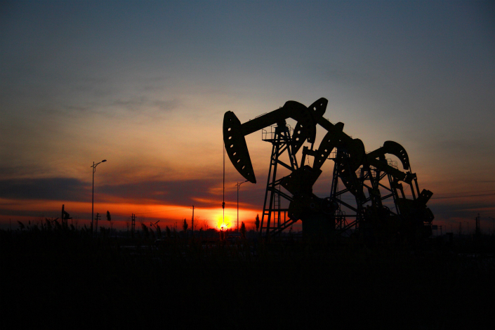 China Huarong Energy Co. Ltd. had completed fracturing operations, testing and the drilling of 36 oil wells in its Kyrgyzstan oil fields by mid-2015, but has not announced any progress since. Photo: Visual China