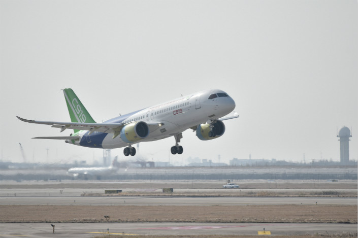 The second protoype of the C919 jetliner has notched a new speed record for the model at 291 mph. Above, the prototype takes off from Shanghai Pudong International Airport on Sunday during its first test flight. Photo: Visual China