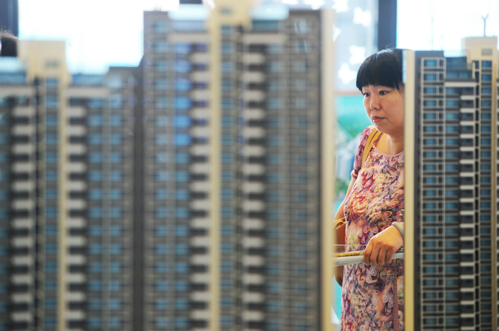 A property tax has been discussed for decades in China. The goals for the tax are to broaden the tax base, increase tax revenue — especially for regional and local governments — and to tax the rich to narrow the wealth gap. Curtailing soaring home prices is less of a factor. Photo: Visual China