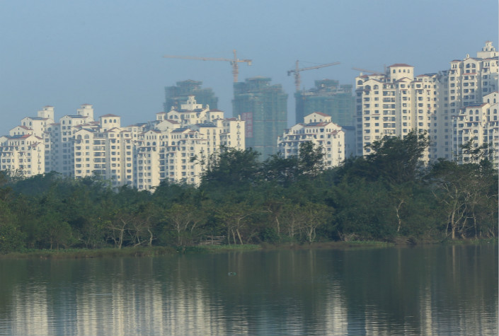 The Hainan provincial government has released revised guidelines for assessing government officials' performance that place more emphasis on protecting the environment. Above, a Hainan commercial housing complex is seen near the city of Qionghai on Nov. 14. Photo: IC