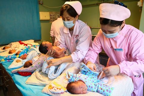 Experts are calling for tax breaks and other incentives to encourage couples to have a second child.  Photo: Visual China