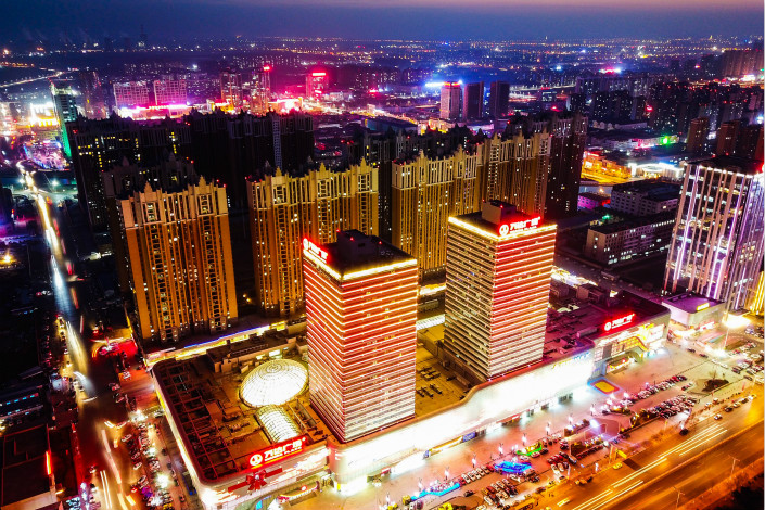 An aerial view of a Wanda Plaza commercial retail space in Dongying, Shandong province. Wanda Chairman Wang Jianlin said the company plans to open two malls and 50 new Wanda Plaza projects in 2018. Last year, Wanda opened 49 new plaza projects. Photo: Visual China