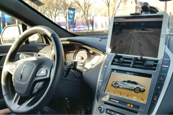A car using Baidu’s autonomous  vehicle technology drives through Xiongan New Area in northern China on Dec. 20. On Tuesday, Wu Xuebin confirmed that he had stepped down as vice president of the company’s self-driving division. Photo: Visual China