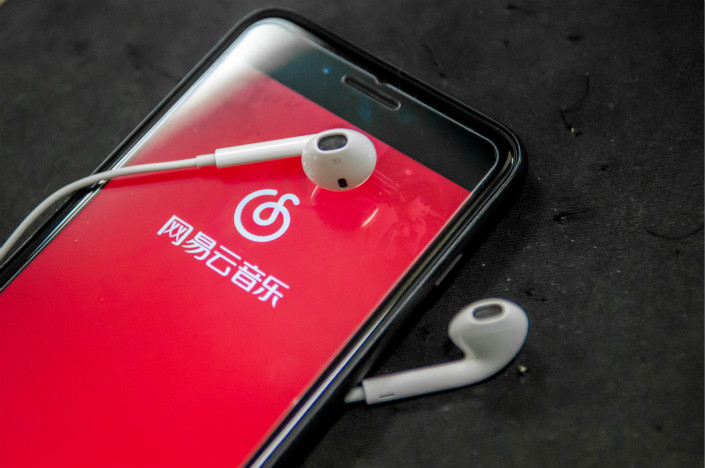The deal between Tencent Music and Netease Music (application picutred) will see them sharing 99% of the songs to which they hold exclusive licenses. Photo: VCG