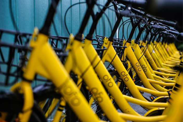 Shared Ofo bikes are lined up on a Beijing street on Sept. 26. Photo: IC