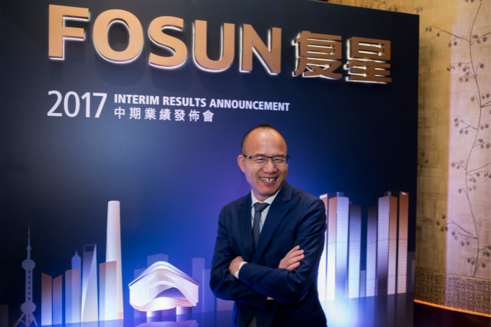 Fosun Group Chairman Guo Guangchang speaks at a news conference in Hong Kong on Aug. 31. Photo: VCG