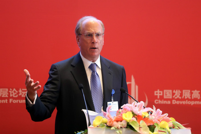 BlackRock founder and Chairman Larry Fink speaks Saturday at the China Development Forum in Beijing. Photo: VCG
