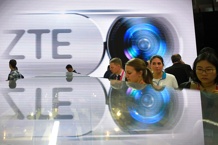In March 2017, ZTE agreed to pay as much as $1.2 billion in fines over allegations that it illegally sold U.S.-made equipment to Iran and North Korea. Above: ZTE Corp.'s stand at the Mobile World Congress in Barcelona on Feb. 23, 2016. Photo: VCG