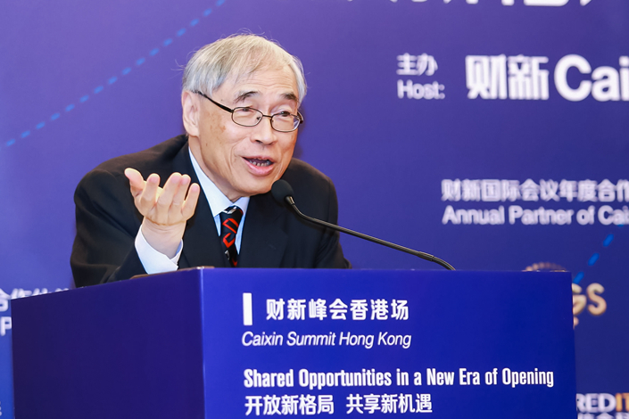 Lawrence J. Lau, the Ralph and Claire Landau professor of economics at the Chinese University of Hong Kong, speaks at Caixin Summit Hong Kong on June 7. Photo: Caixin