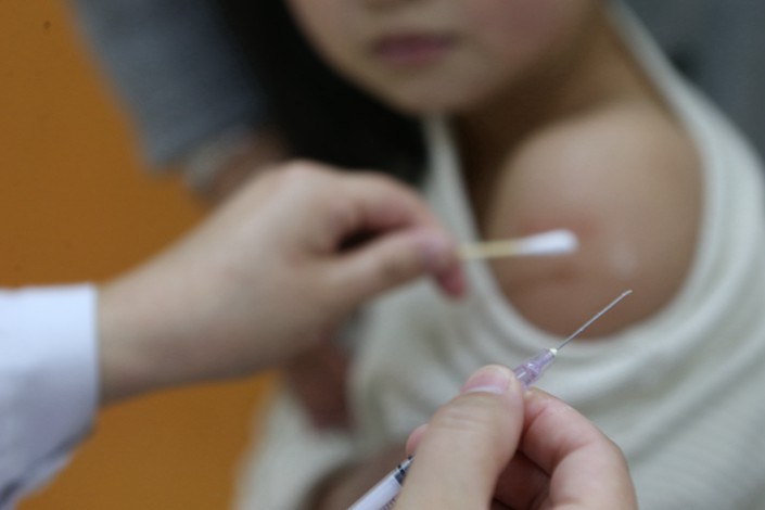 A boy is vaccinated at a hospital in Shanghai in March 2016. Photo: IC