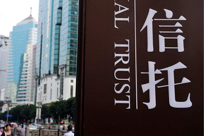 China’s trust sector has been reeling from new rules that tighten controls over the $16 trillion asset management sector. Photo: VCG