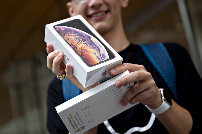 Apple's iPhones — the majority of which are made by assembly partner Hon Hai Precision Industry Co. Ltd. in China — have so far been spared in the China-U.S. trade war.Photo: Bloomberg