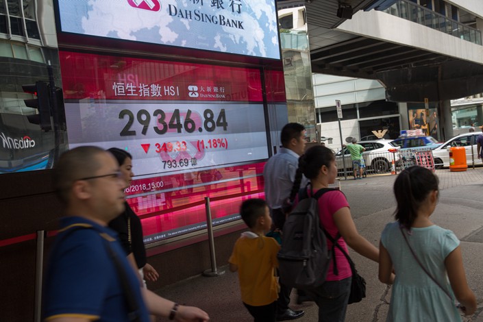 An electronic billboard in Hong Kong shows updates to the Hang Seng Index on May 21. Photo: IC