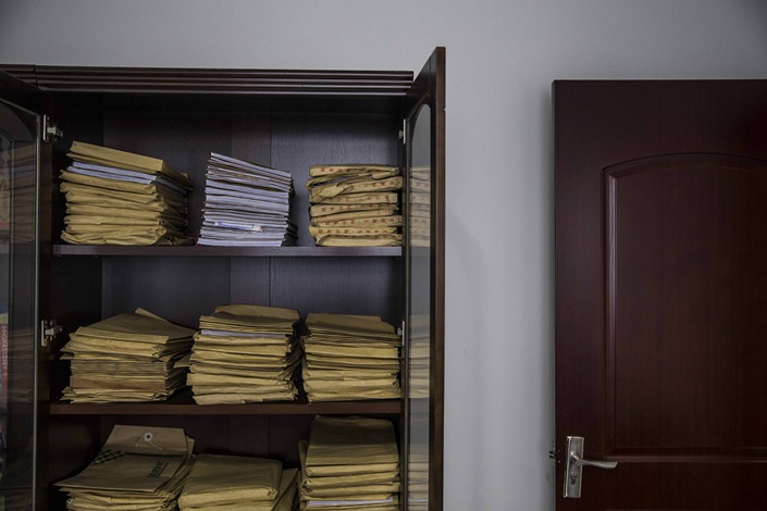 Lawsuit files kept at a local court in Shanxi province. Photo: VCG