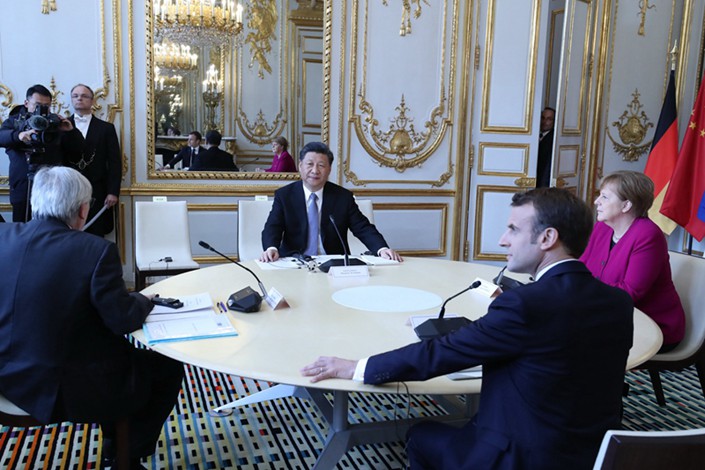 Chinese President Xi Jinping holds talks in Paris with French President Emmanuel Macron, German Chancellor Angela Merkel and European Commission President Jean-Claude Juncker on March 26. Photo: Xinhua