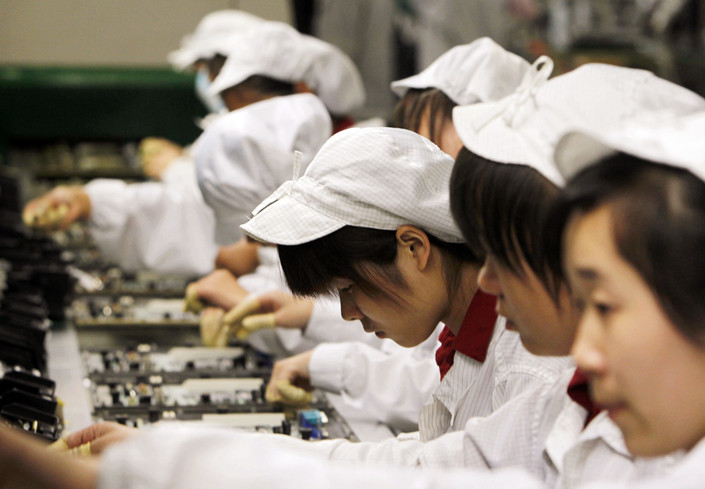Staff works on a production line at a Foxconn factory in Shenzhen, South China's Guangdong province in May 2017. Photo: IC Photo