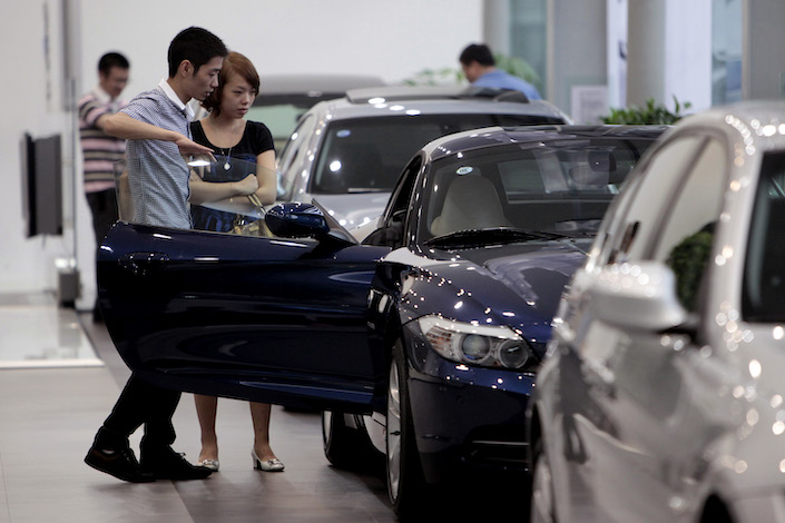 China encourages local governments to “support” car sales and pushes for more consumption of electronics. Photo: Bloomberg