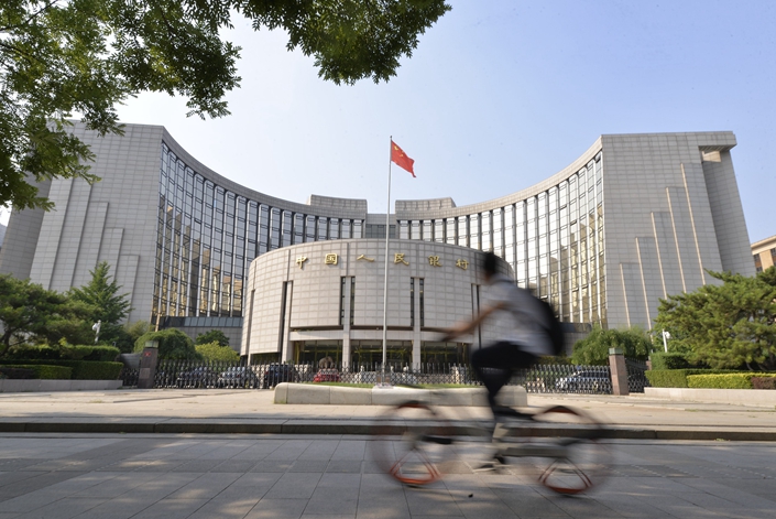 China’s central bank increased the total outstanding quota of short-term commercial paper for five major brokerages to nearly 200 billion yuan in a bid to inject more liquidity into the interbank market. Photo: VCG