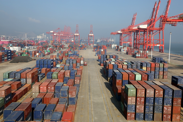Stacks of containers bound for overseas sit at a port in East China’s Jiangsu province on June 10. Photo: IC Photo