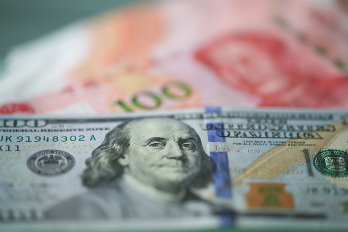 The yuan has dropped 2.3% against the dollar so far in August, although it recovered slightly on Thursday to close at 7.0443. Photo: IC Photo